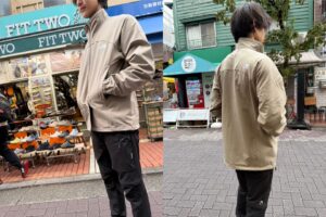 Staff wearing the Advanced Jacket. Excellent wind resistance and stretch for active movement.