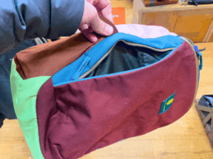 Cotopaxi Allpa Daypack 18L side access pocket